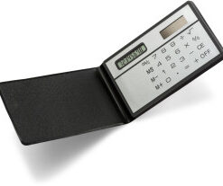 Solar powered eight digit credit card size calculator in a smoot